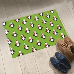 Merry Christmas With Penguins On A Blue Sky Background Door Mat